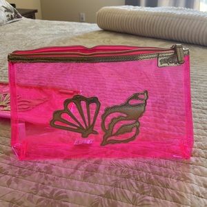 Lilly Pulitzer clear hot pink/ gold clutch.